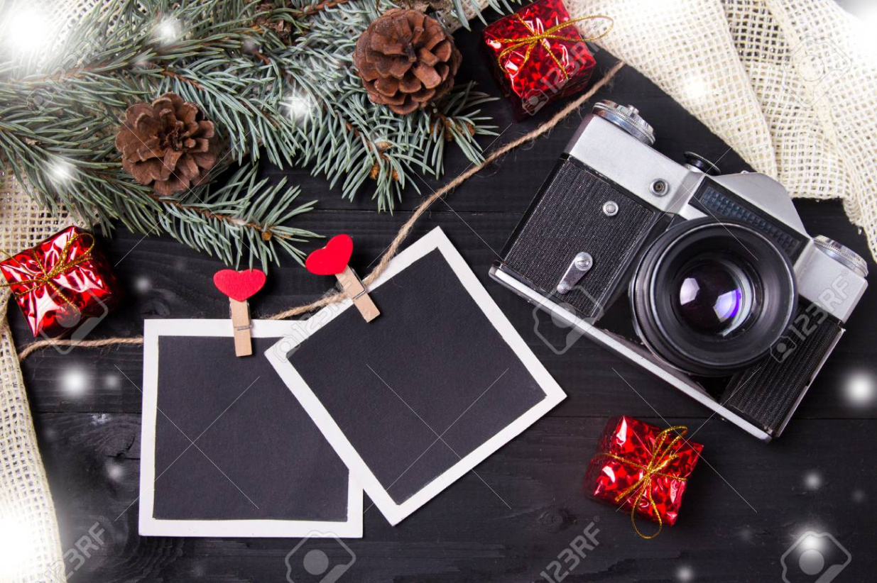 Camera Christmas Wooden Background. New Year