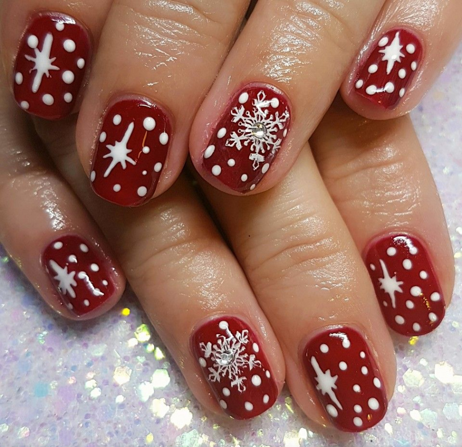 Christmas nails! Red gel polish on natural nails with handpainted