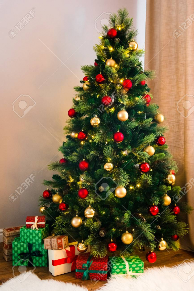 Wonderful Christmas Tree Decorated With Traditional Red And Yellow