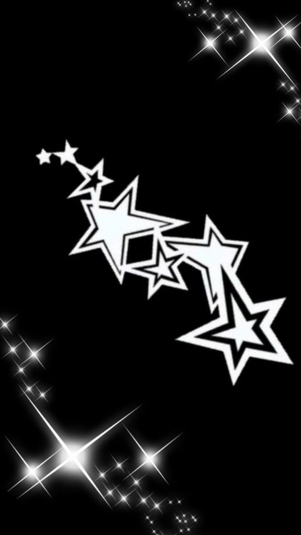 Yk white stars, white shiny sparkles with black background in