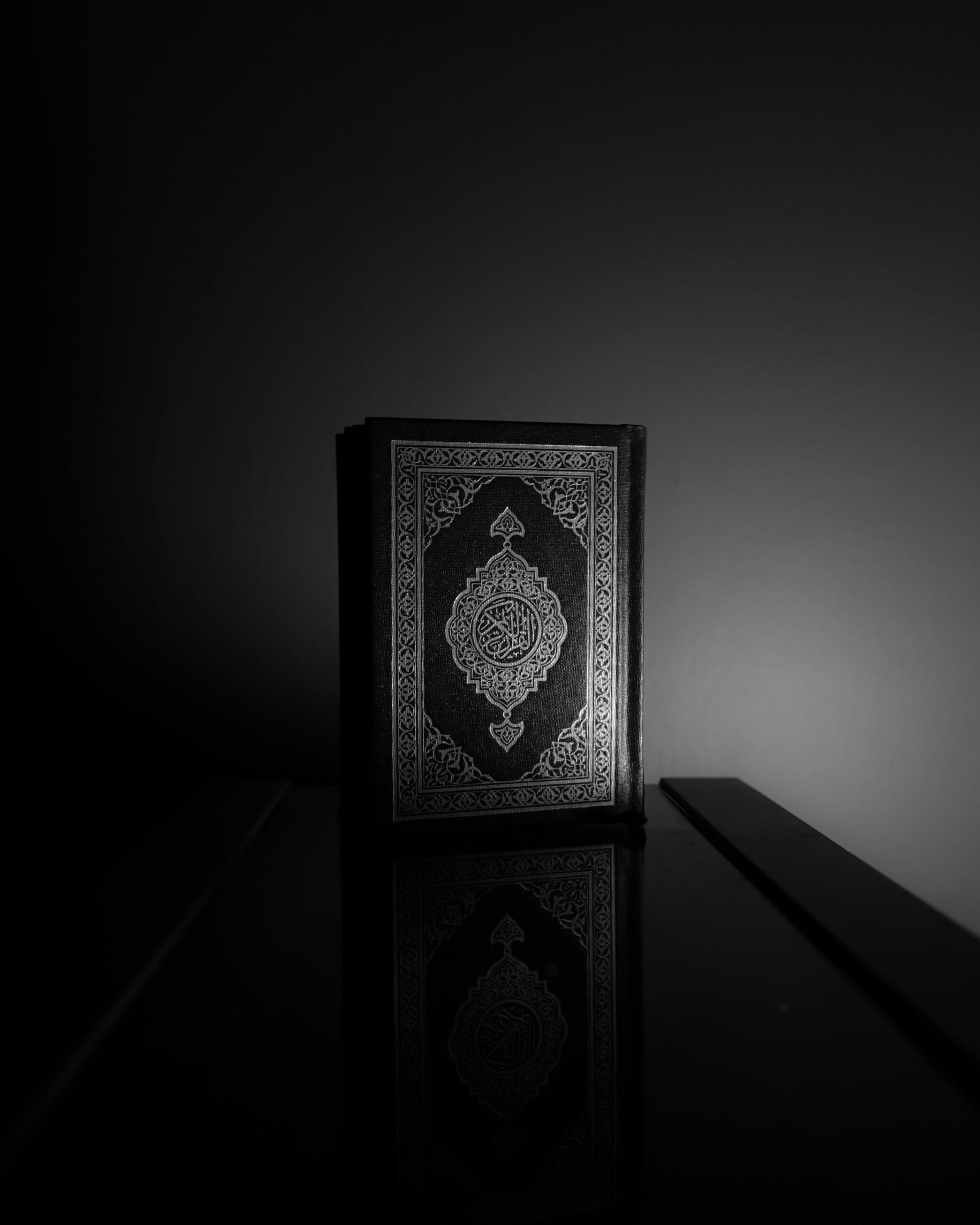 Grayscale Photo of a Quran · Free Stock Photo